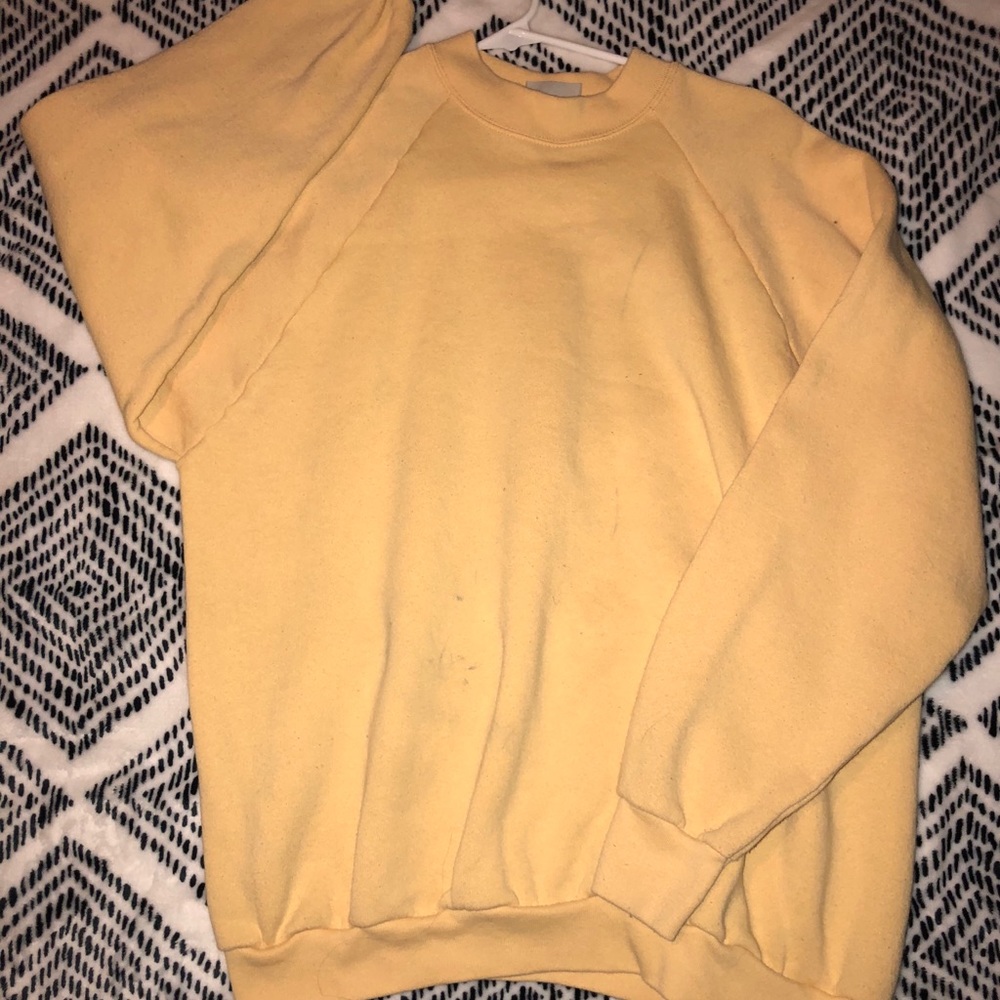 Faded yellow sweatshirt